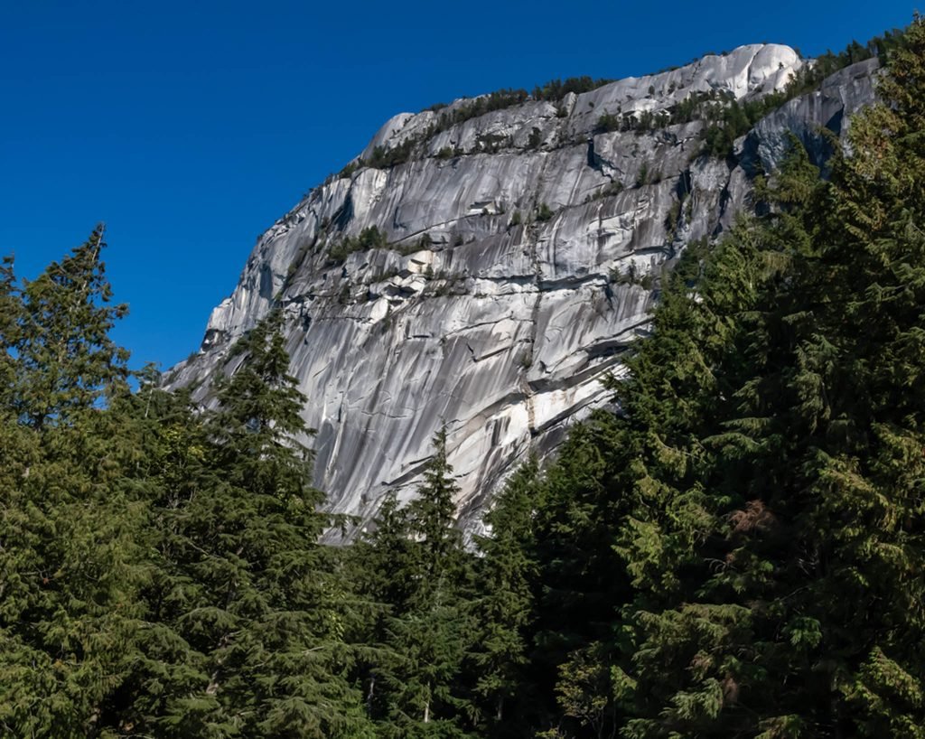 The Stawamus Chief, officially known as Stawamus Chief Mountain and often simply called The Chief (or less commonly, Squamish Chief), is a granitic dome situated near the town of Squamish in British Columbia, Canada. Rising over 700 meters (2,297 feet) above the waters of Howe Sound, it is one of the largest granite monoliths in the world.