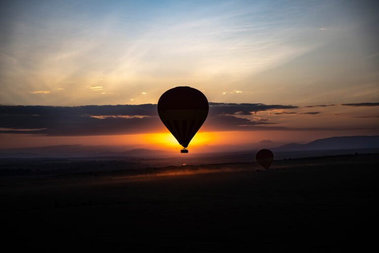 Hot air balloon ride over Maasai Mara at sunrise, Kenya, Africa.