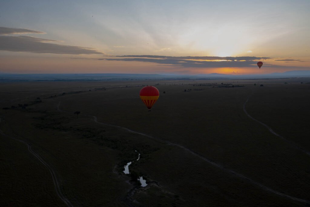 Hot air balloons over Maasai Mara, Kenya, Africa.