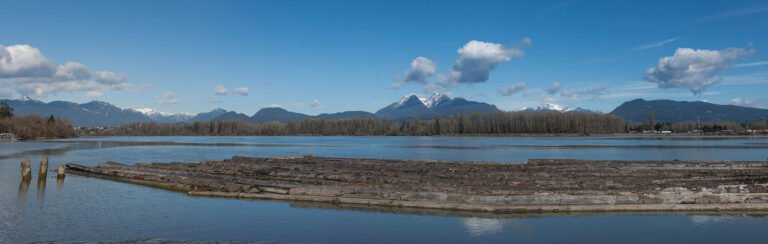 Panoramic photo of Golden Ears Mountains seen from Brae Island