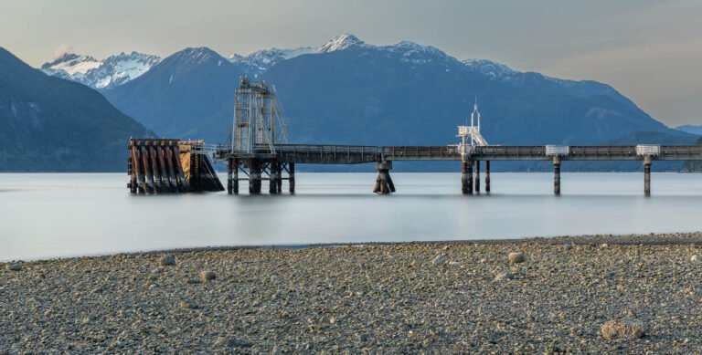 Porteau Cove Pier, Howe Sound and Britannia Mountain Range, British Columbia, Canada.
